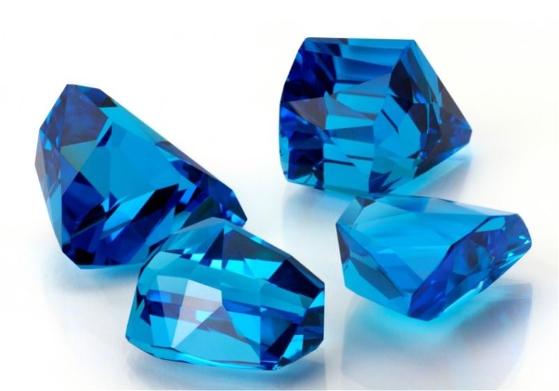 Imagem em destaque de pedras topázio na cor azul 